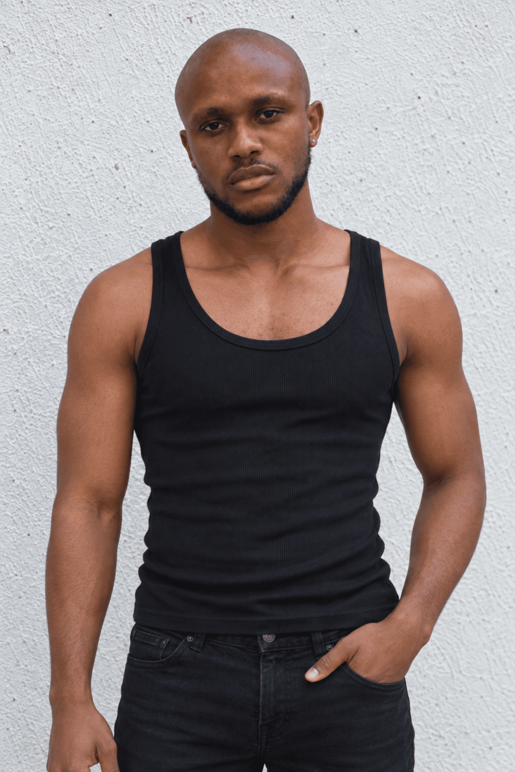 Waist-up portrait of Muiz